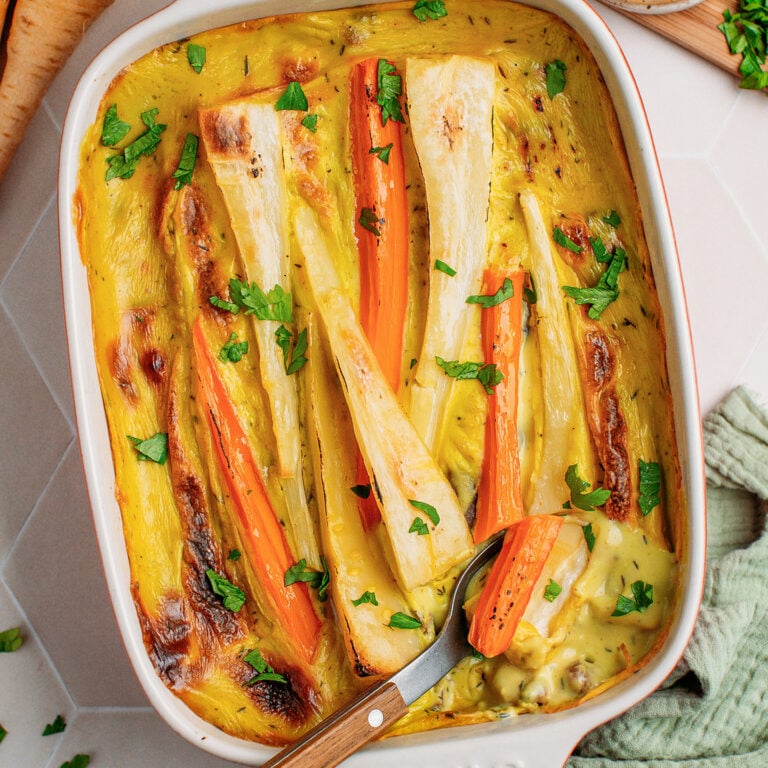 Baked parsnips and carrots in a casserole.