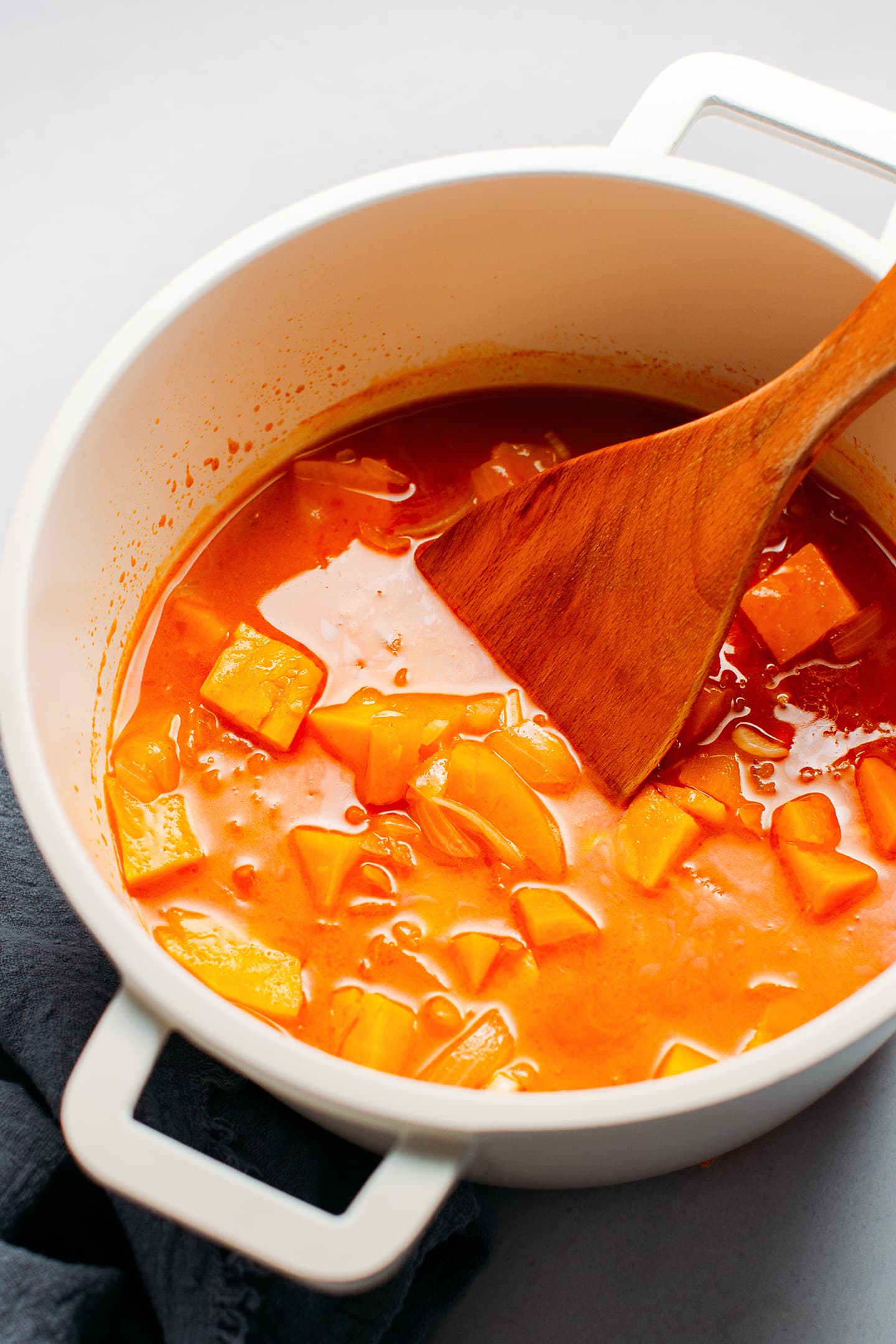 Cooked sweet potatoes in a pot.