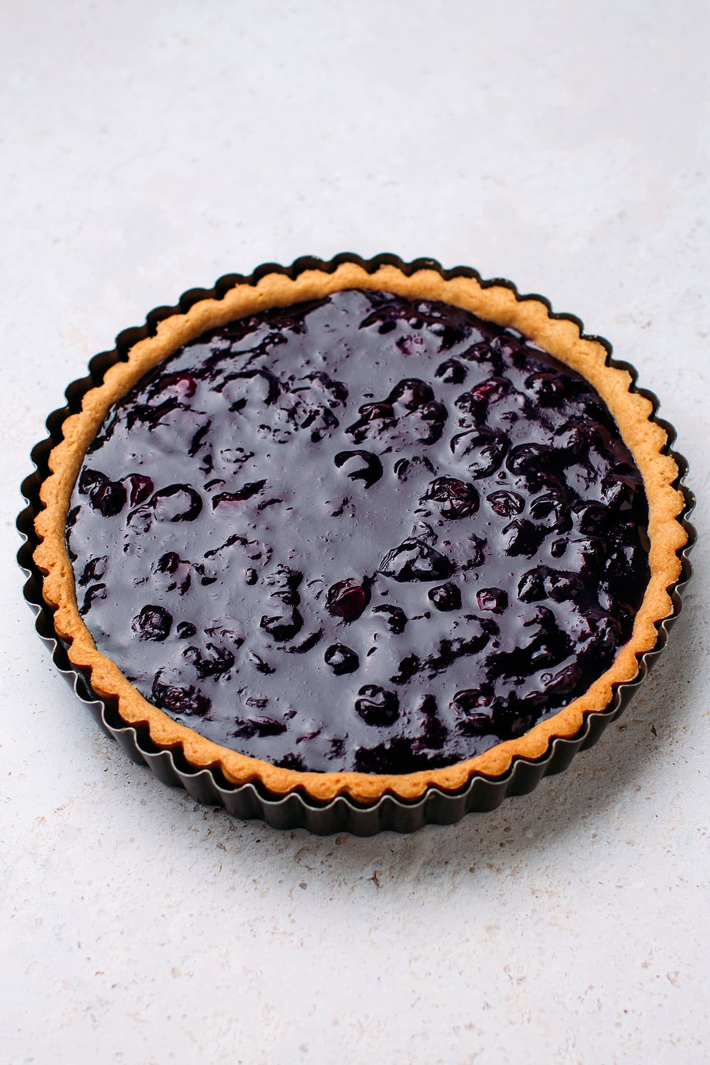 Shortcrust pastry filled with blueberry filling.