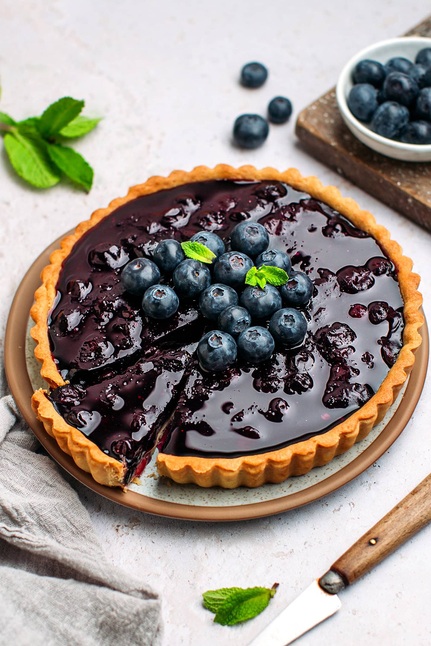 Blueberry tart with fresh blueberries.