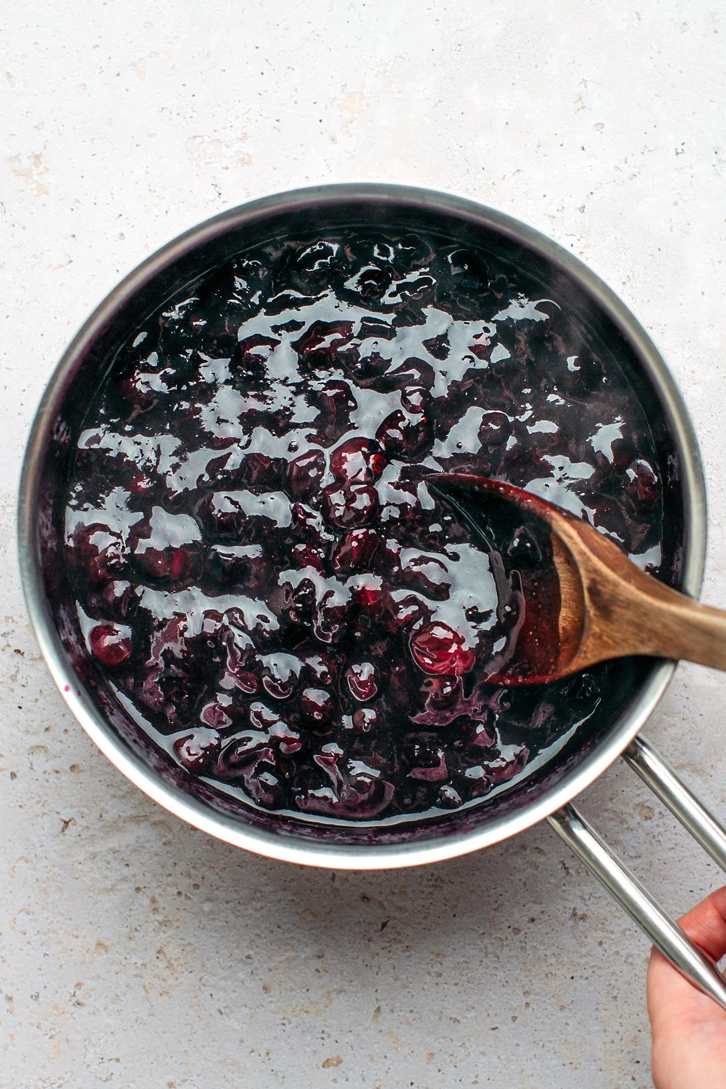 Cooked blueberry in a saucepan.