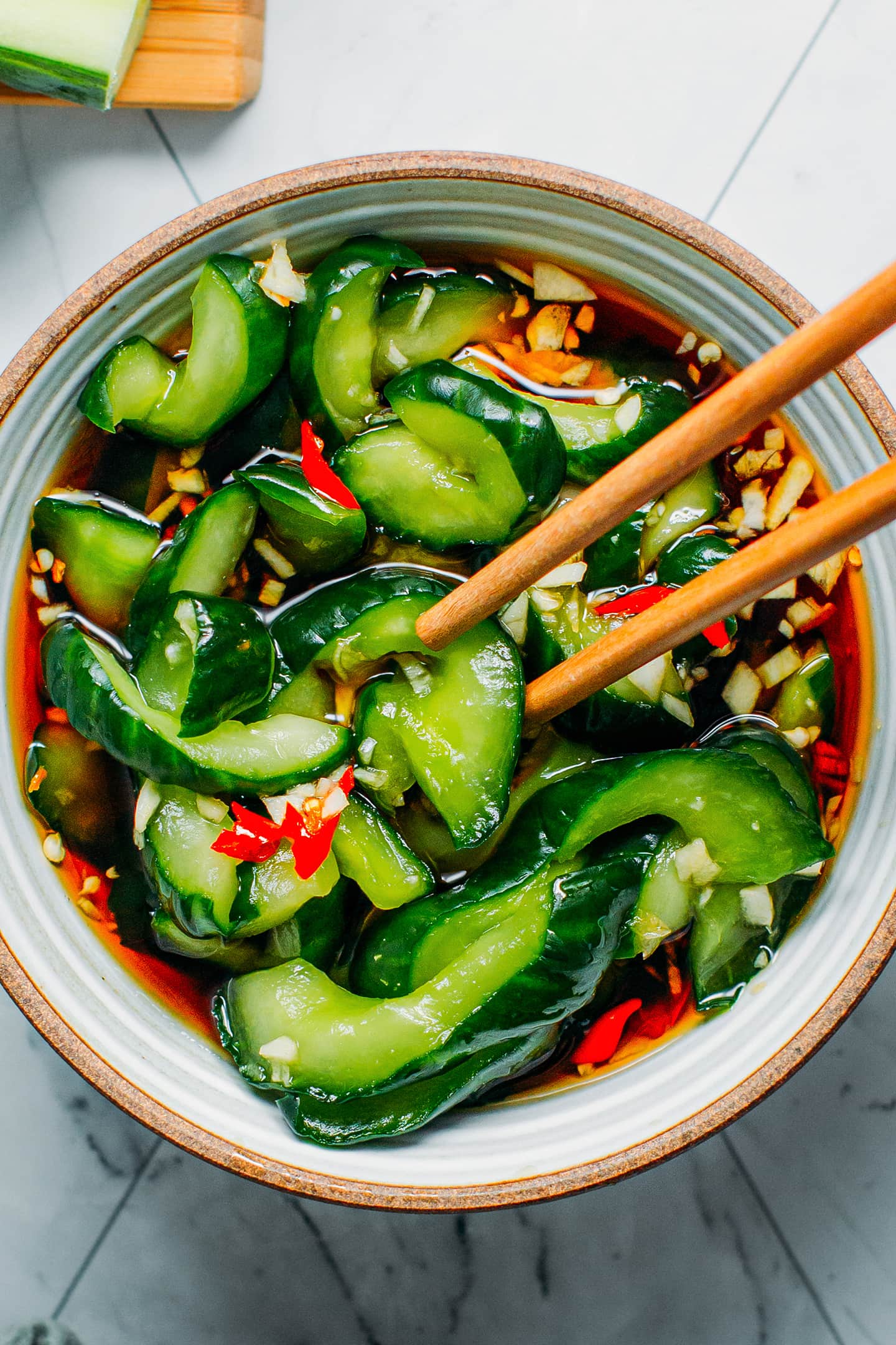 Close up of spicy cucumber pickles.