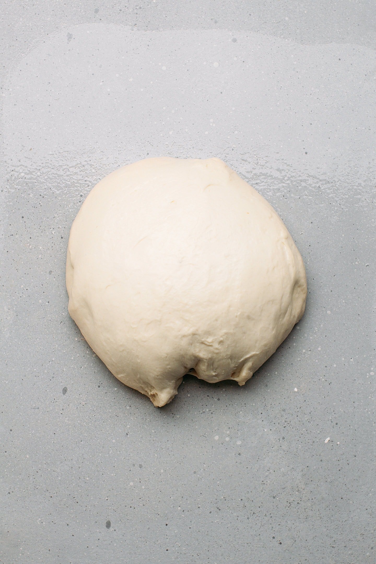 Ball of dough on a working surface.