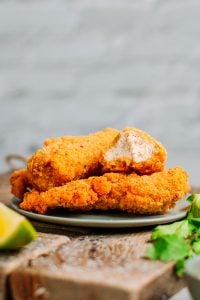 Delicious and crispy vegan chicken nuggets on a plate.