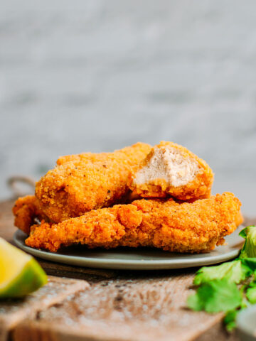 Delicious and crispy vegan chicken nuggets on a plate.