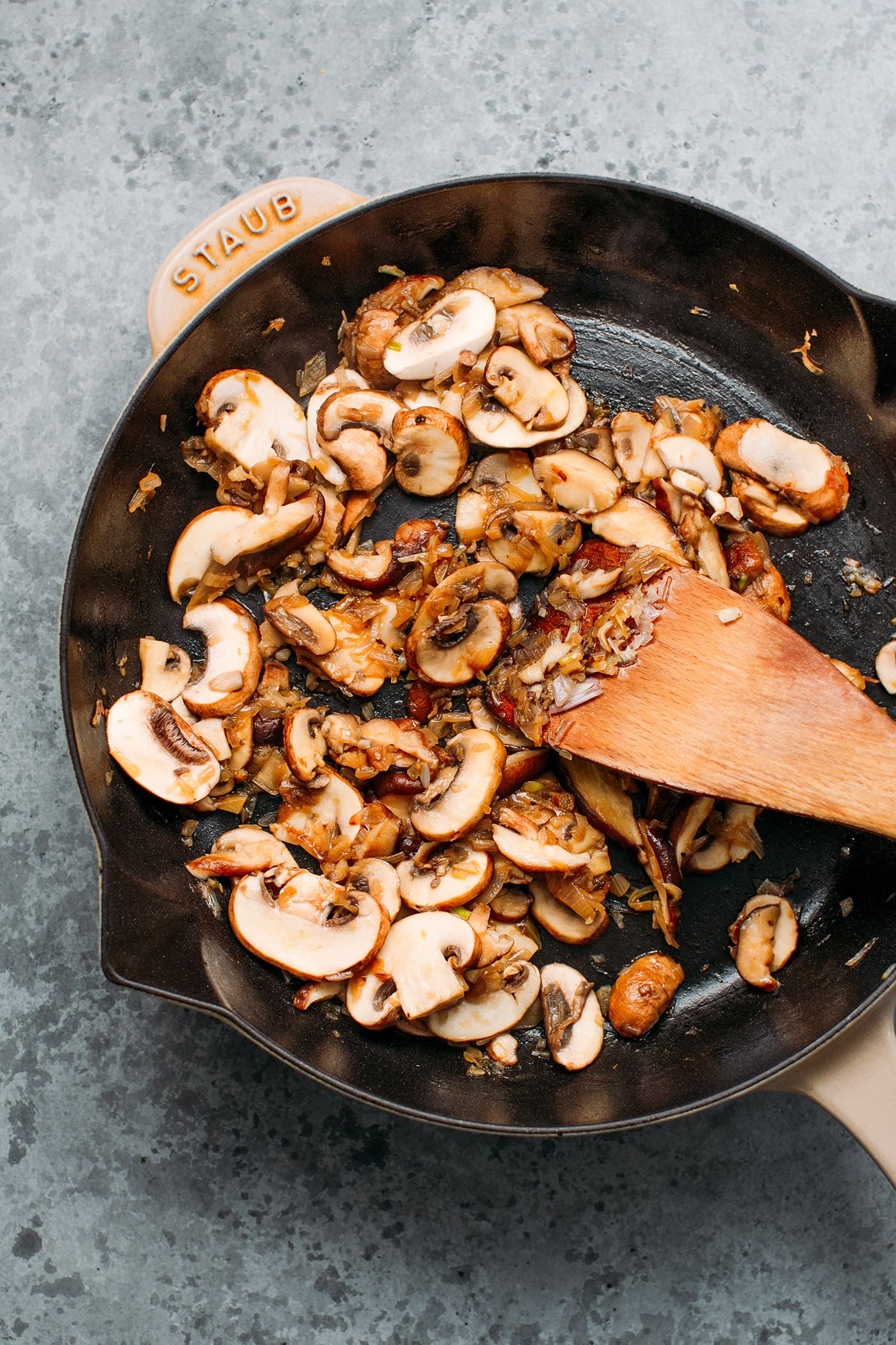 Sautéed mushrooms in a skillet.