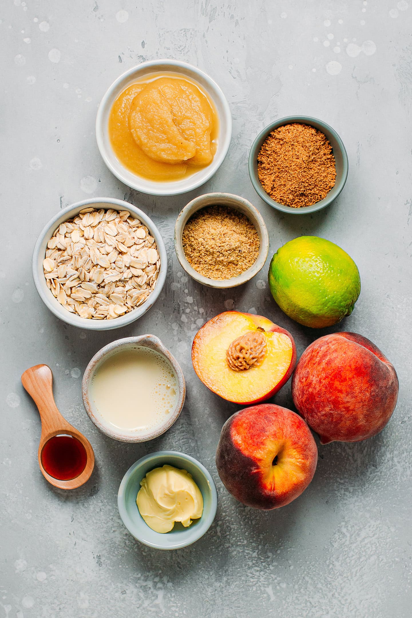 Ingredients like oats, coconut sugar, peaches, and applesauce.