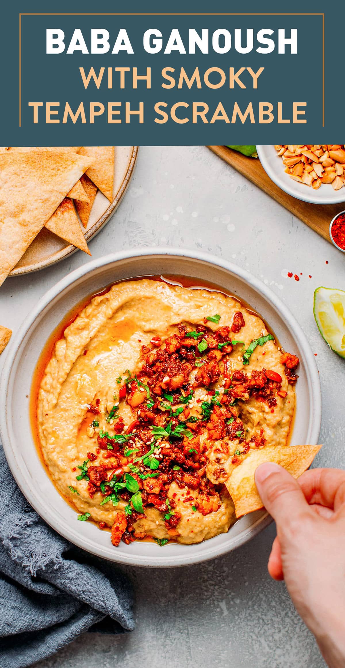 Roasted eggplant dip infused with cumin and smoked paprika, topped with a spicy and smoky tempeh scramble! A delicious plant-based appetizer! #plantbased #eggplant #vegan #tempeh