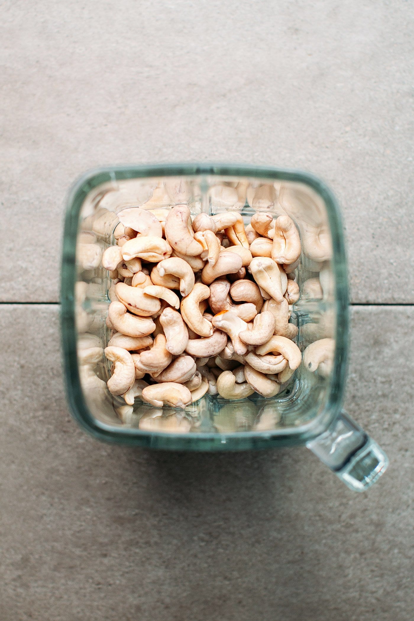 Soaked cashews and water in a blender.