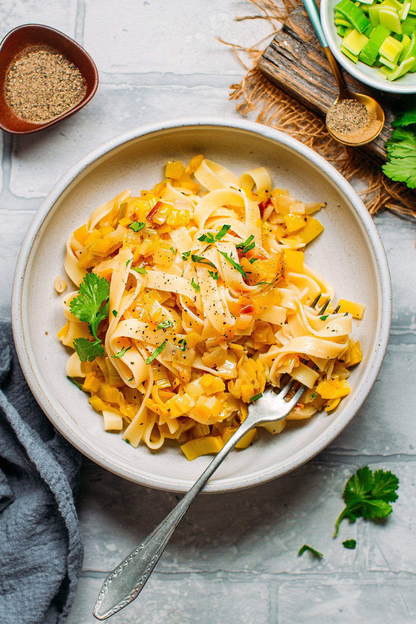 Pasta with melted leeks in a bowl