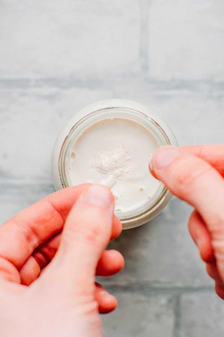 Adding probiotics to cashew cream.