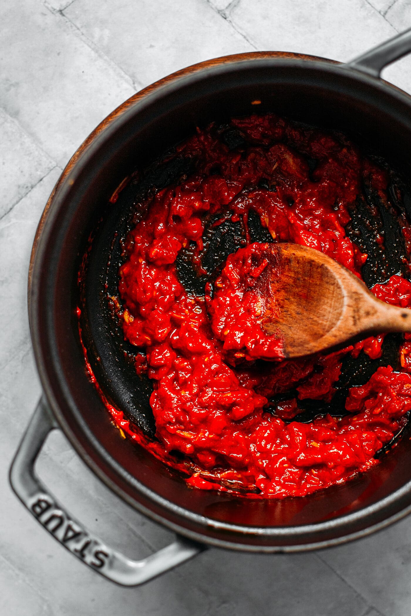 Cooking tomatoes in a dutch oven.