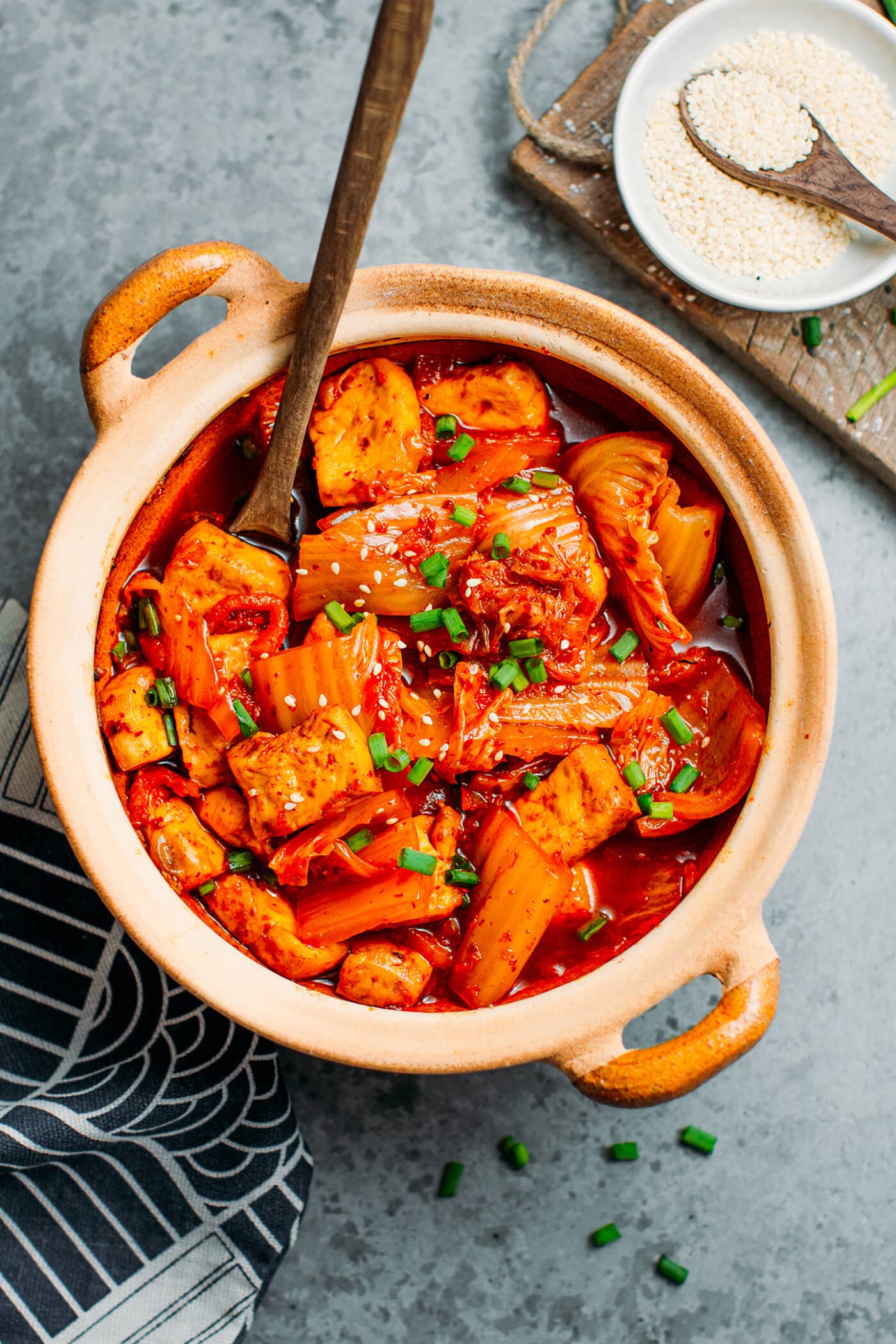 Kimchi stew in a clay pot with tofu.