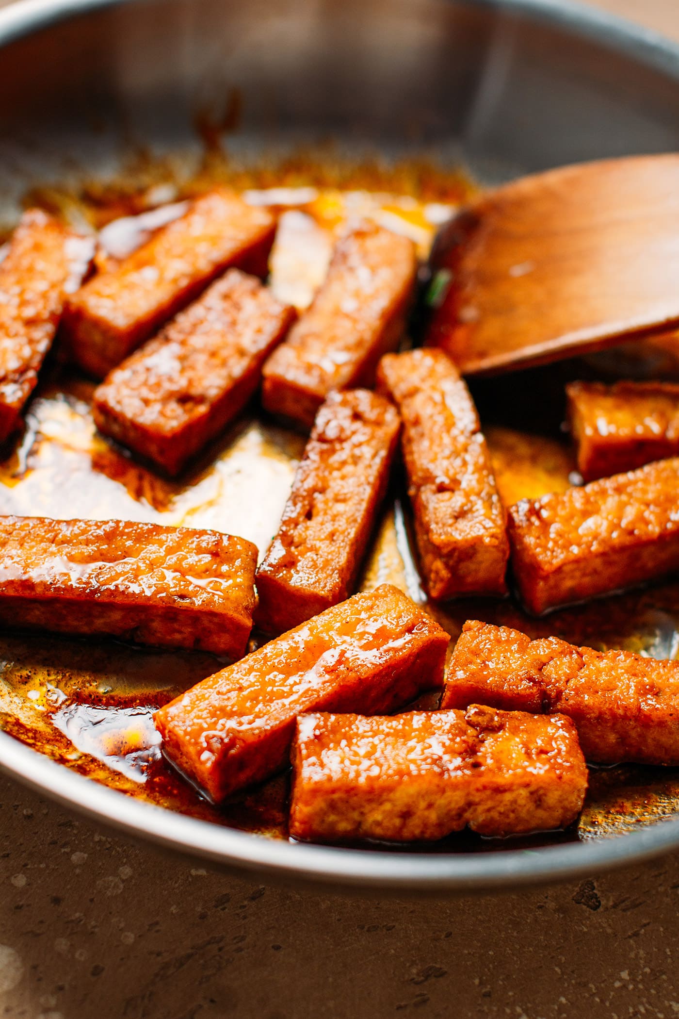 Fried tofu simmered in soy sauce and chili sauce.