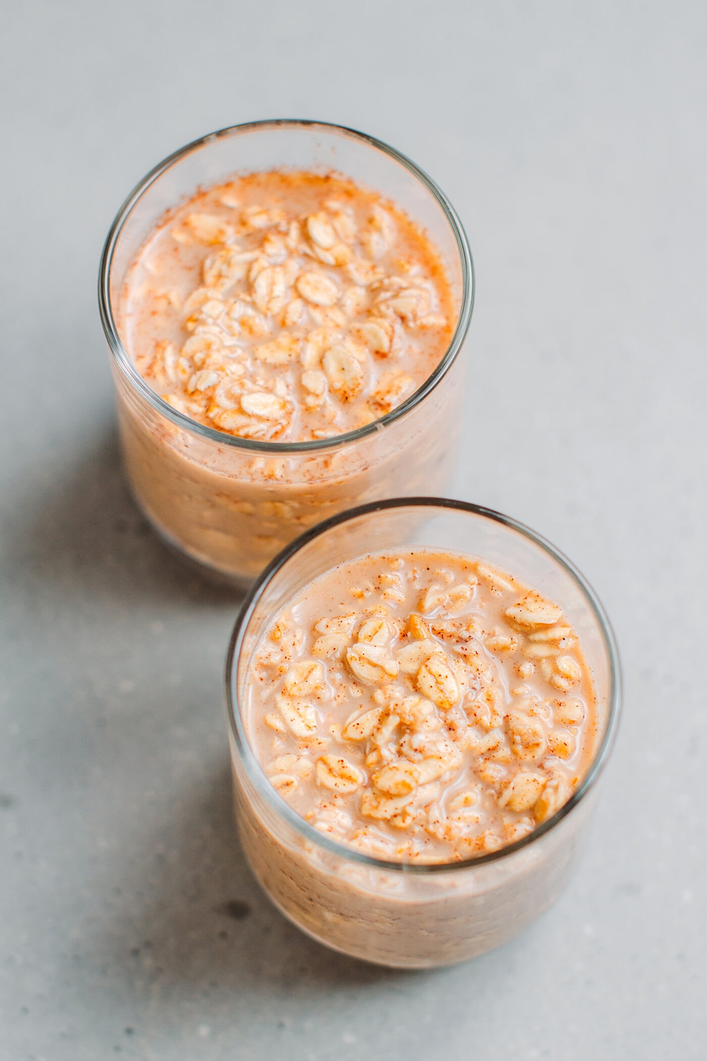 Chai spiced overnight oats in glass jars.