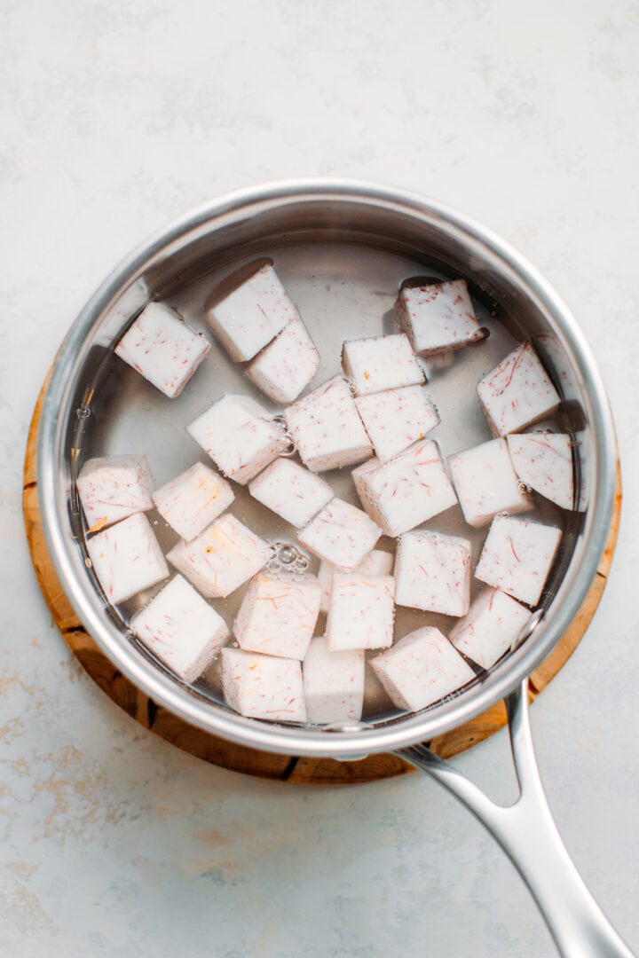 Diced taro in a saucepan.