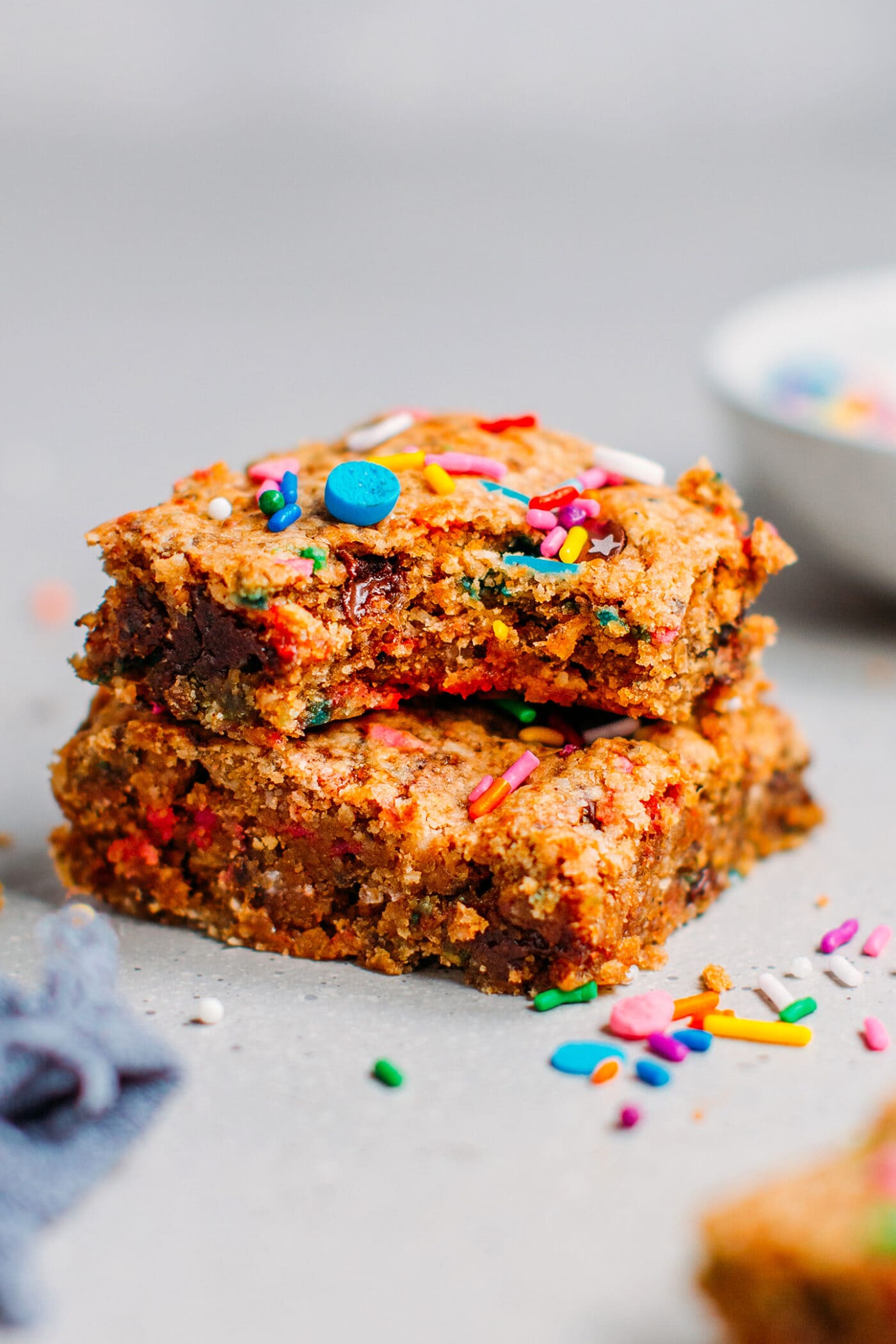 Vegan protein blondies with chocolate chips and sprinkles.