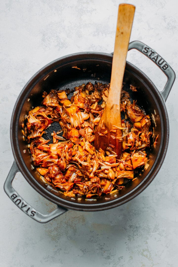 Sautéed jackfruit in a Dutch oven.