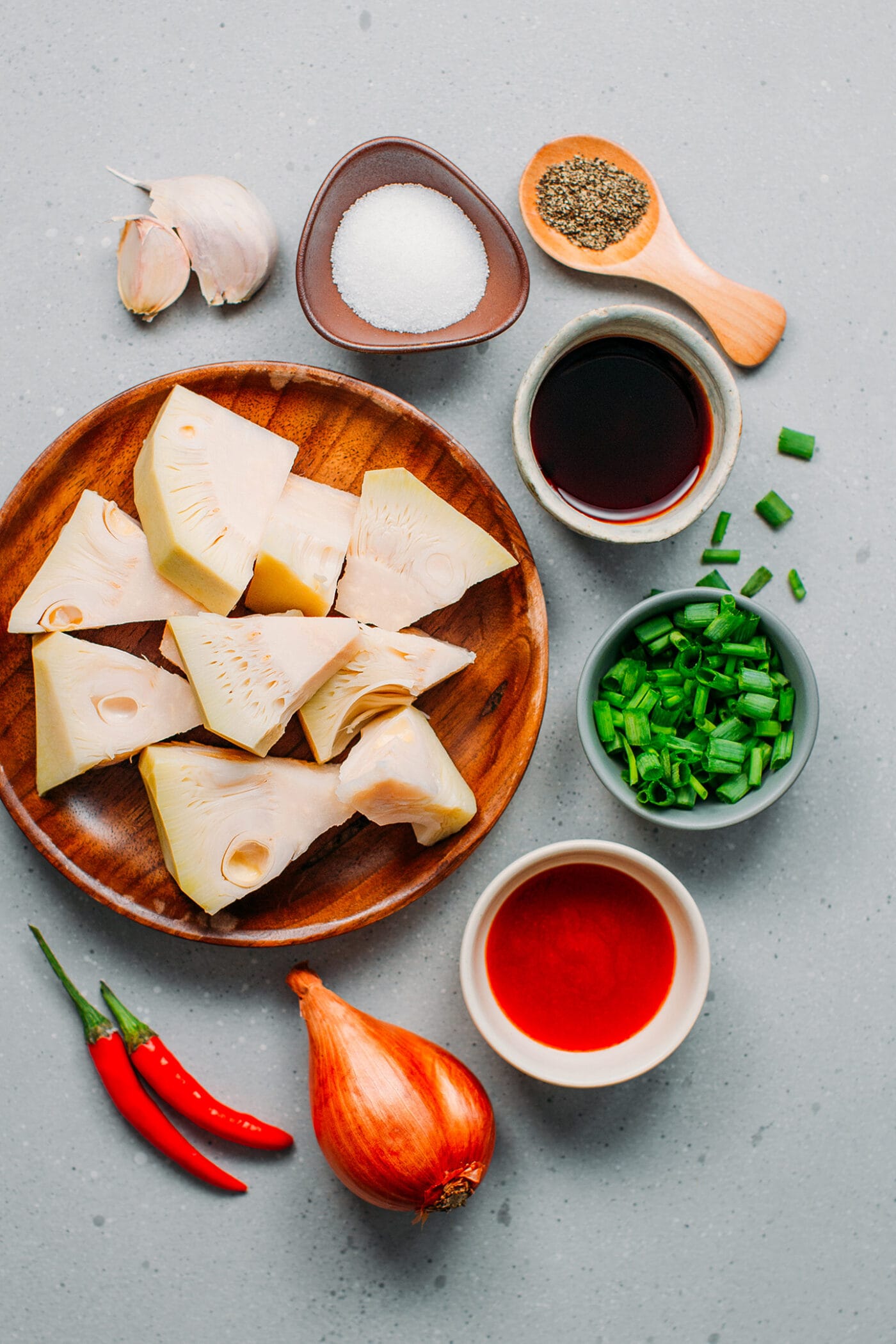 Ingredients like jackfruit, shallots, green onions, soy sauce, and garlic.