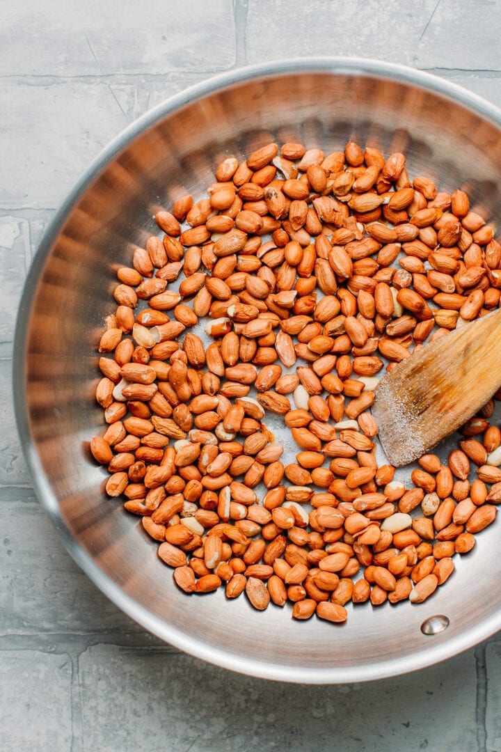 Toasting peanuts in a skillet.