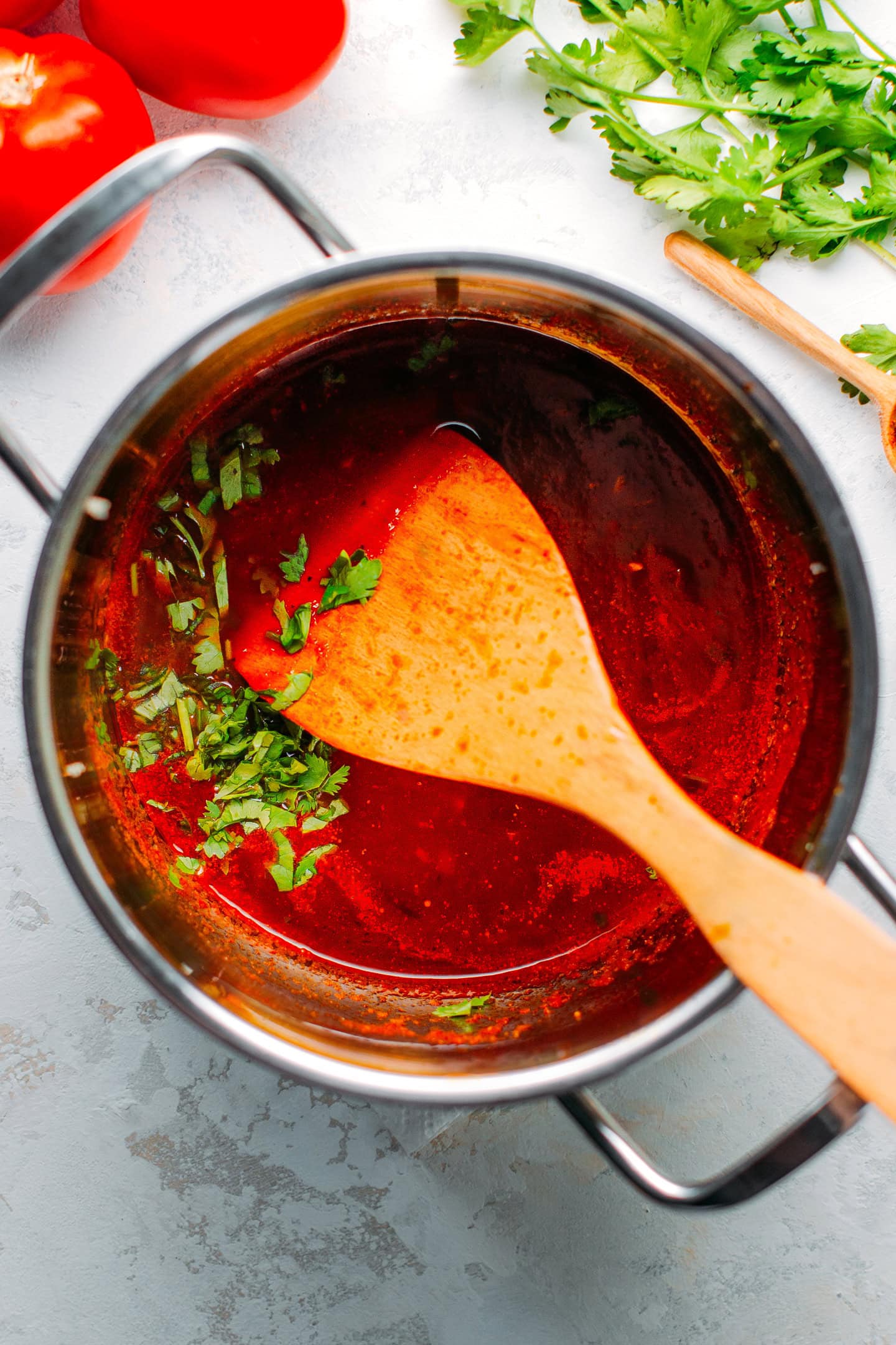 Bánh Mì sauce in a saucepan topped with cilantro.