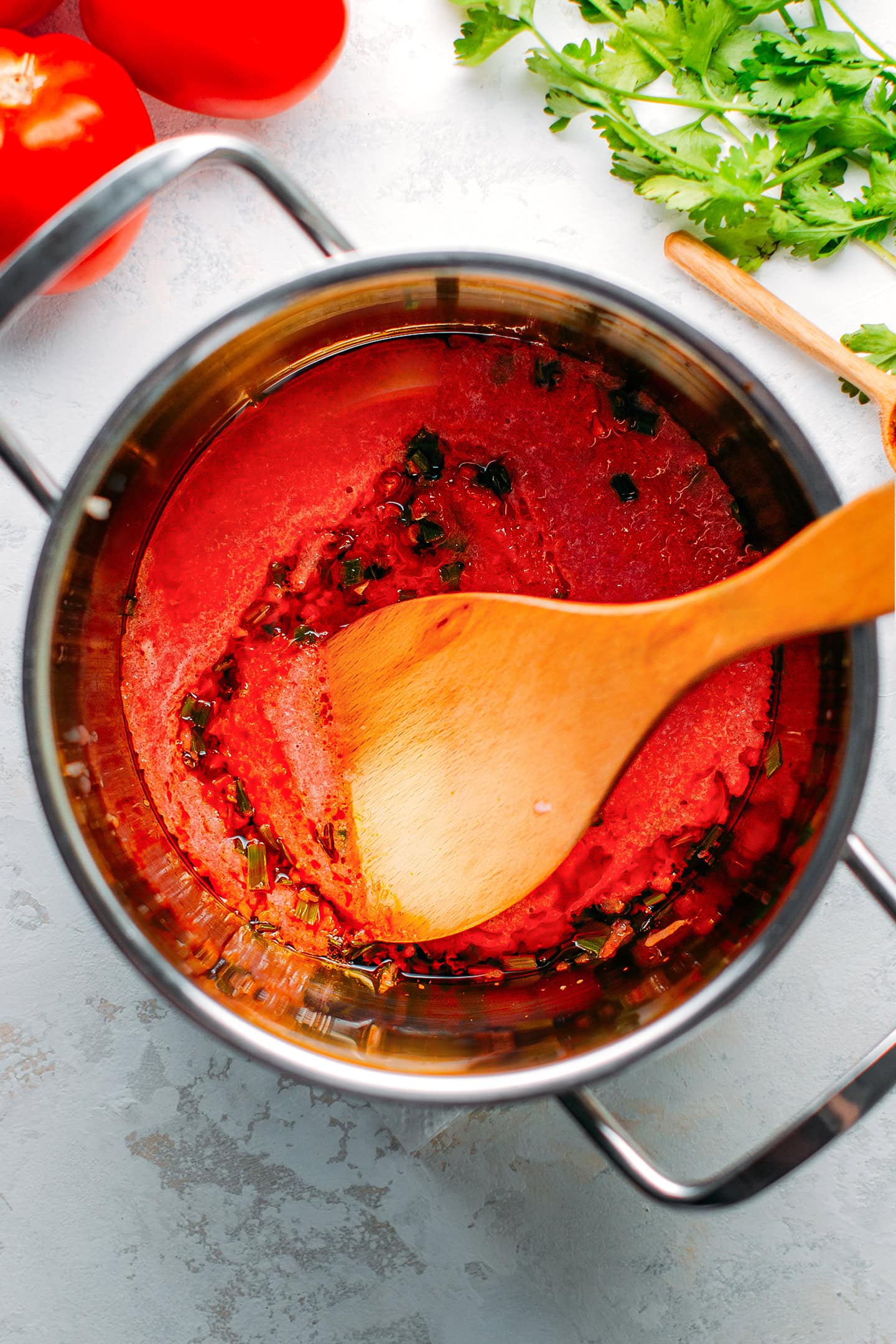 Preparing Bánh Mì sauce in a saucepan.