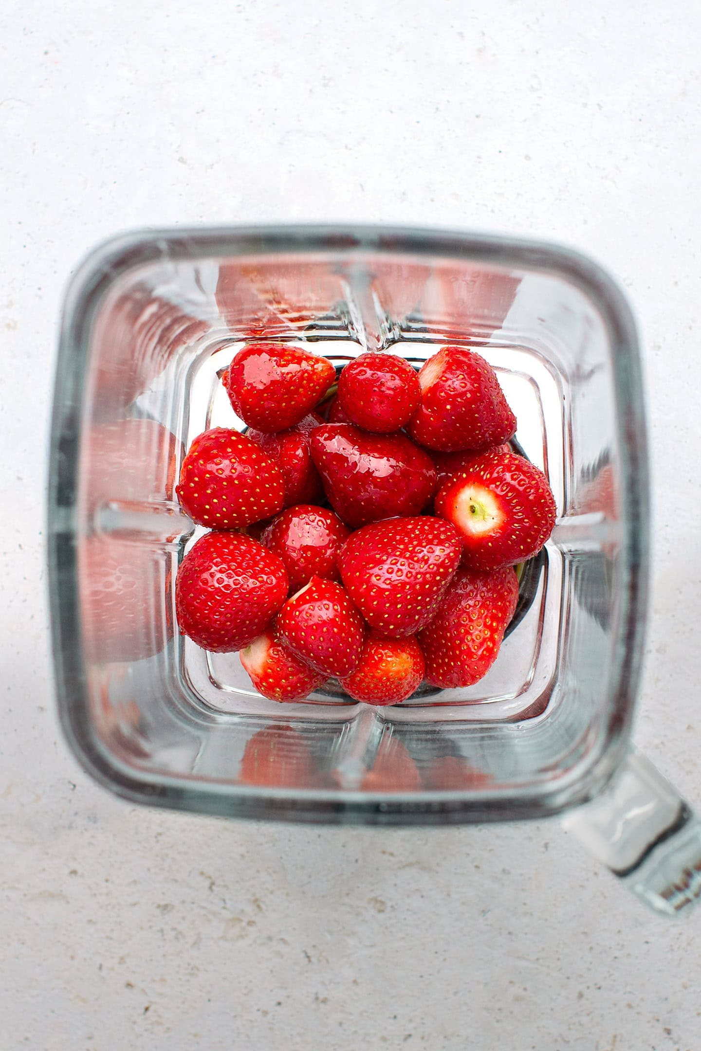 Strawberries in a blender.