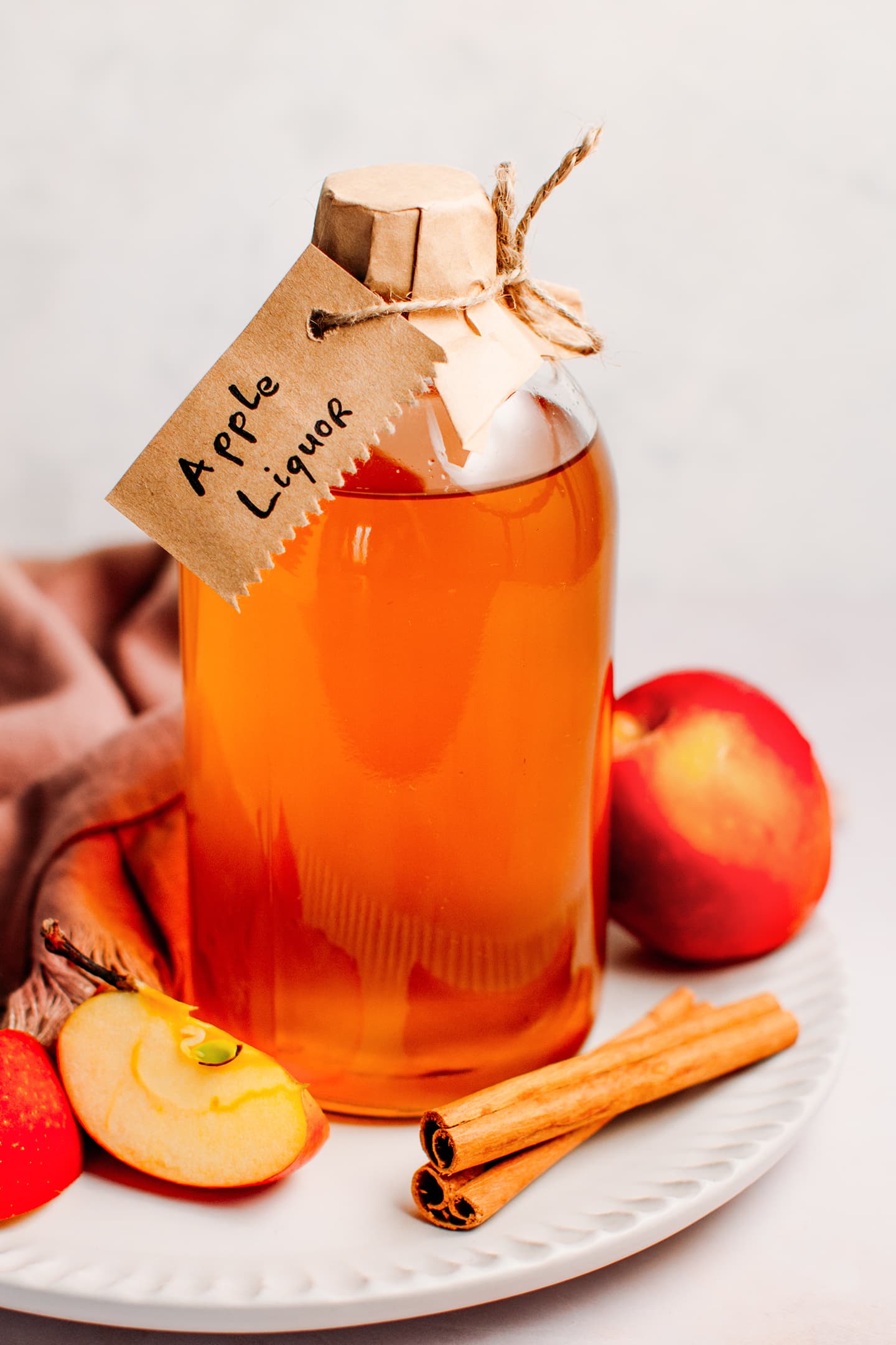 Homemade Apple Liquor Full of Plants