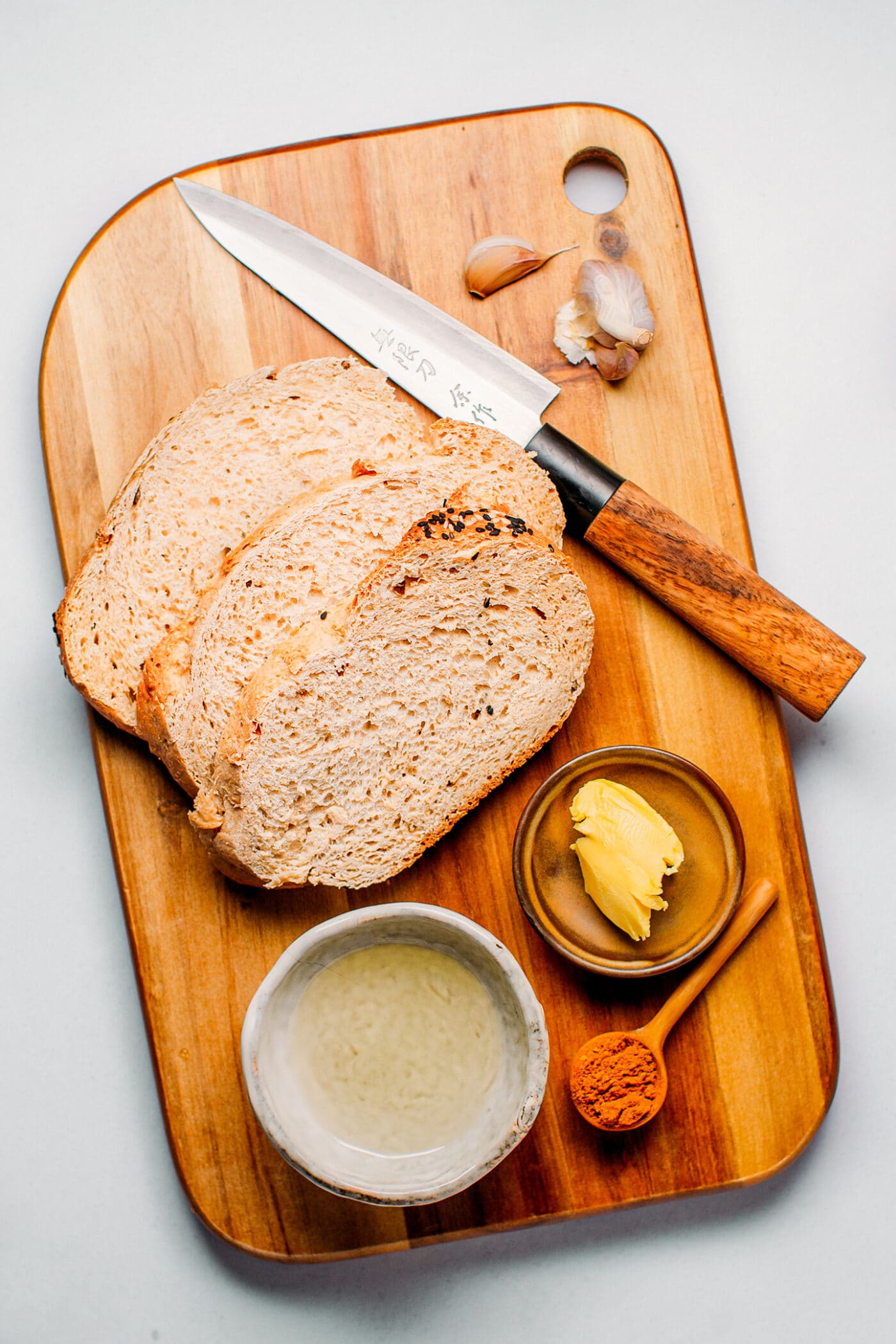 Ingredients like bread, butter, garlic, and curry powder.