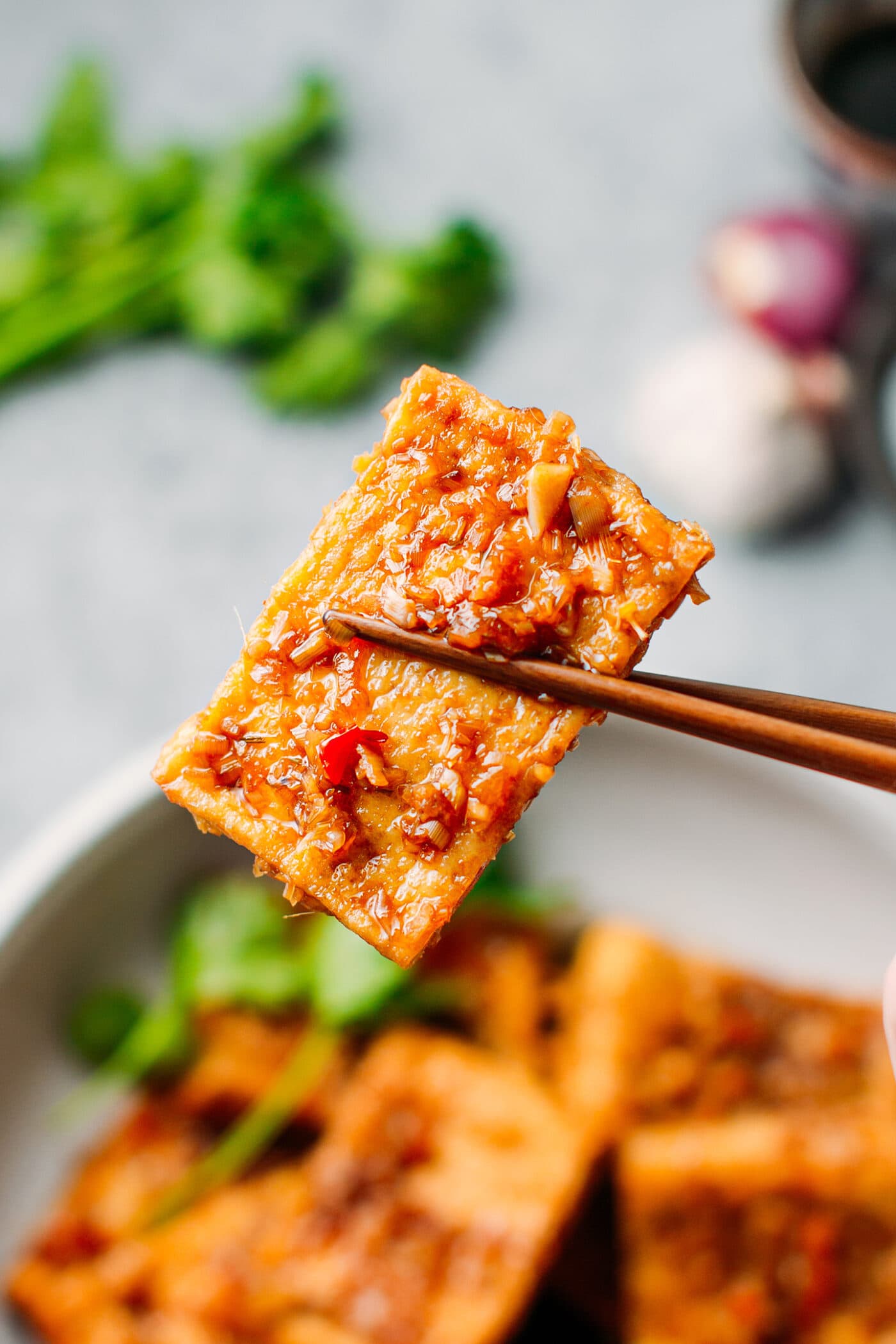 Close-up of a slice of lemongrass tofu.