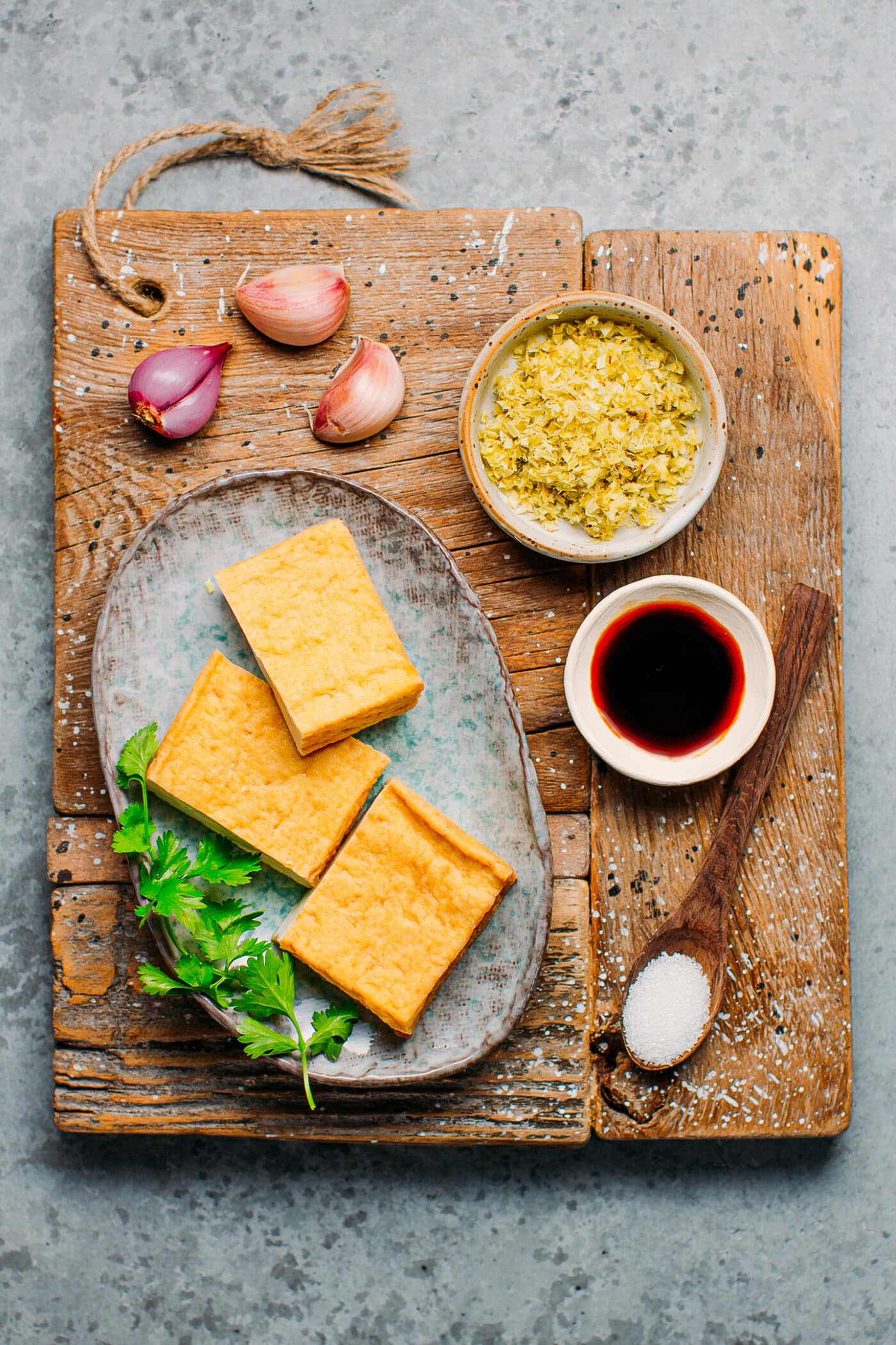 Ingredients like tofu, lemongrass, shallots, garlic, and soy sauce.