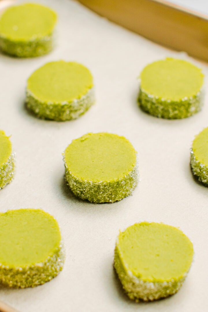 Matcha diamond cookies on a baking sheet.