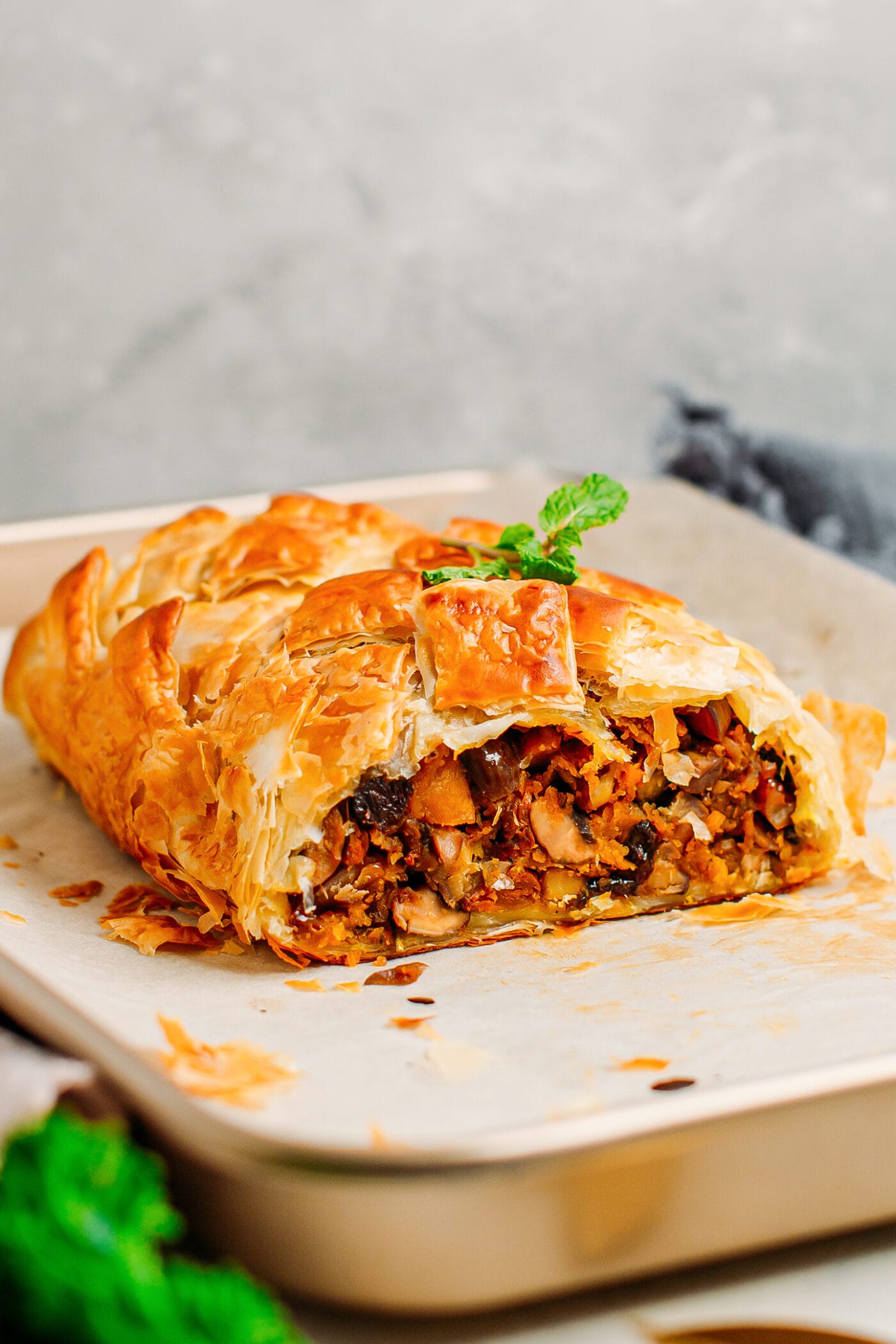 Close up of vegan Wellington with butternut squash, chestnuts, and mushrooms.