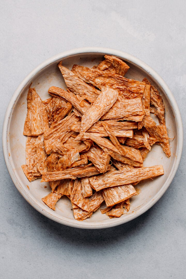 Sliced TVP slices in a bowl.