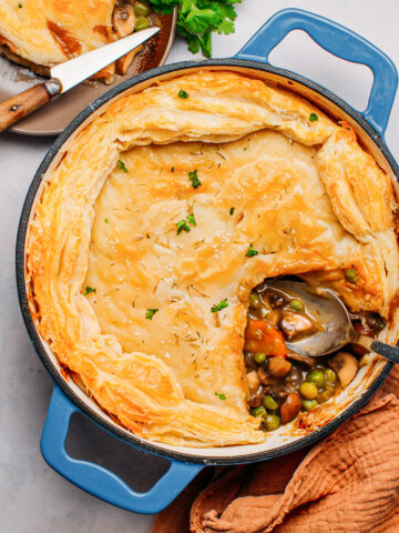 Mushroom pot pie topped with puff pastry.