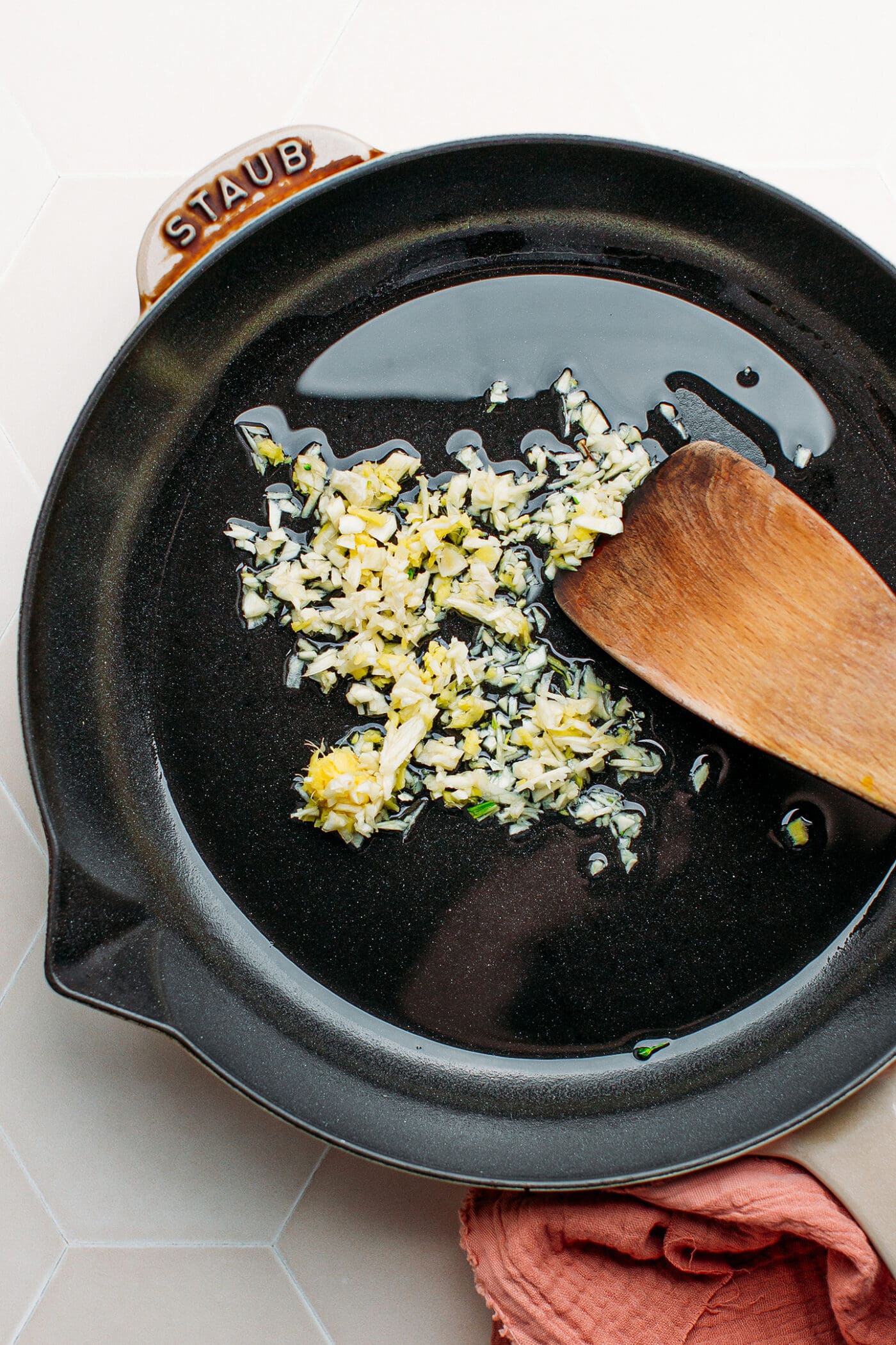 Ginger and garlic in a skillet.