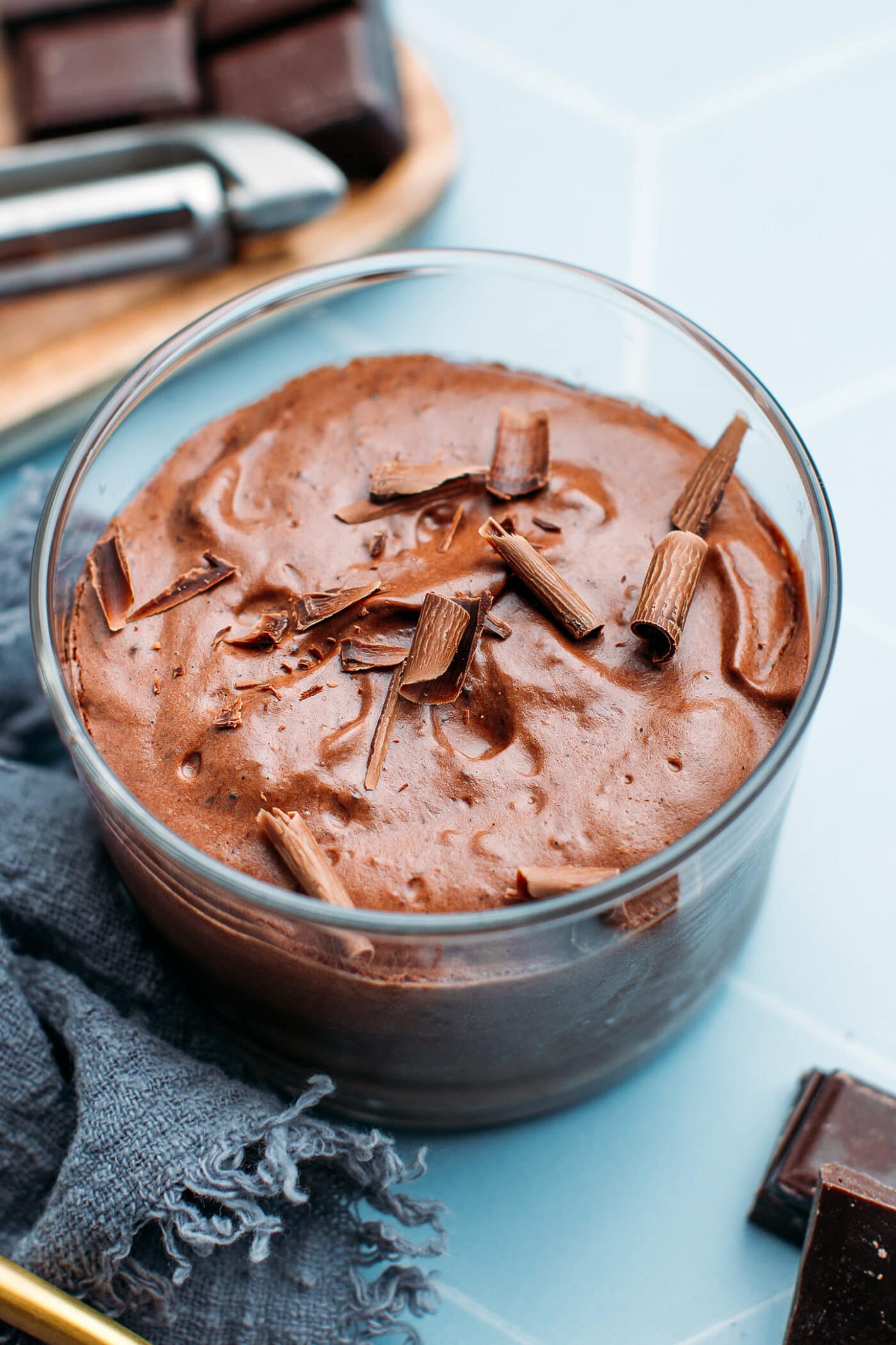 Close-up of vegan chocolate mousse with shaved chocolate.