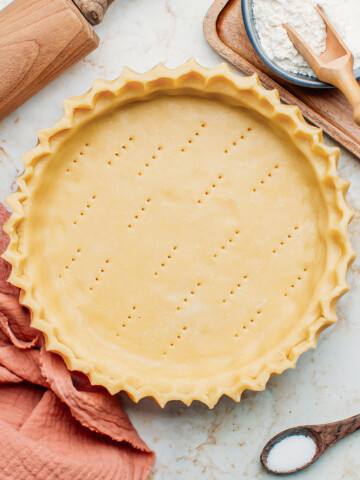Homemade vegan pie crust in a pan.
