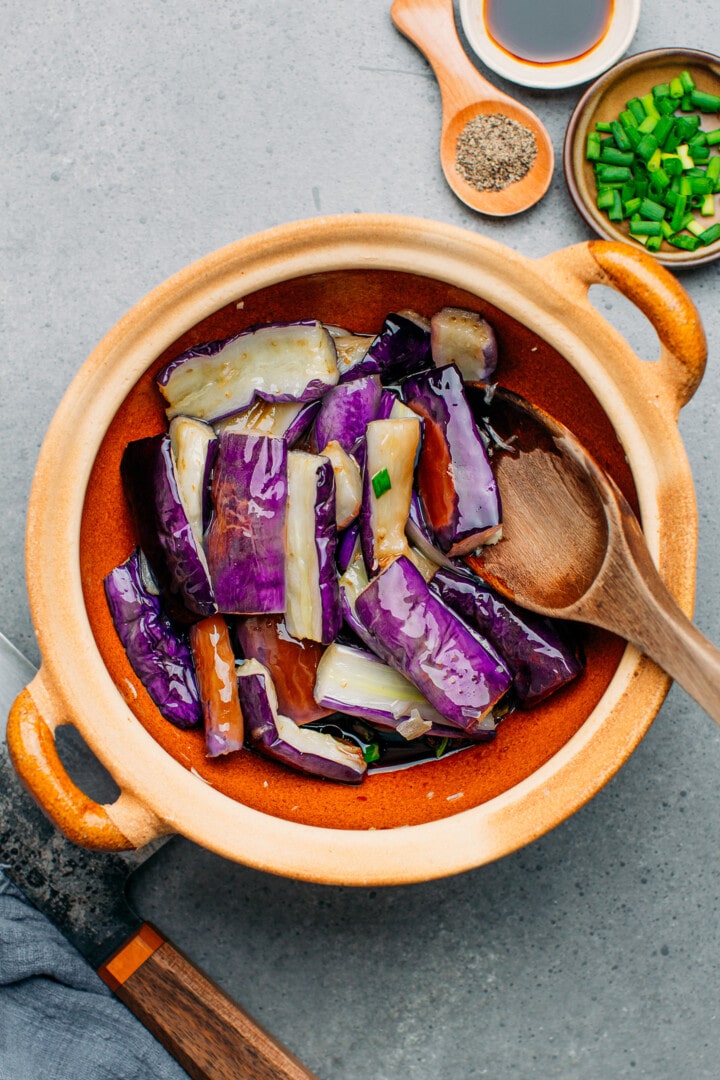 Sliced Chinese eggplant in a clay pot.