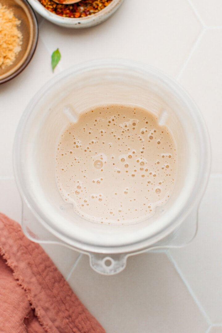 Cashew sauce in a blender.