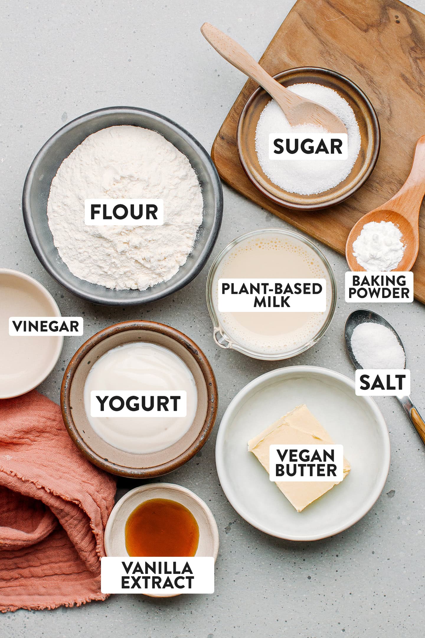 Ingredients like flour, sugar, butter, yogurt, and baking powder.
