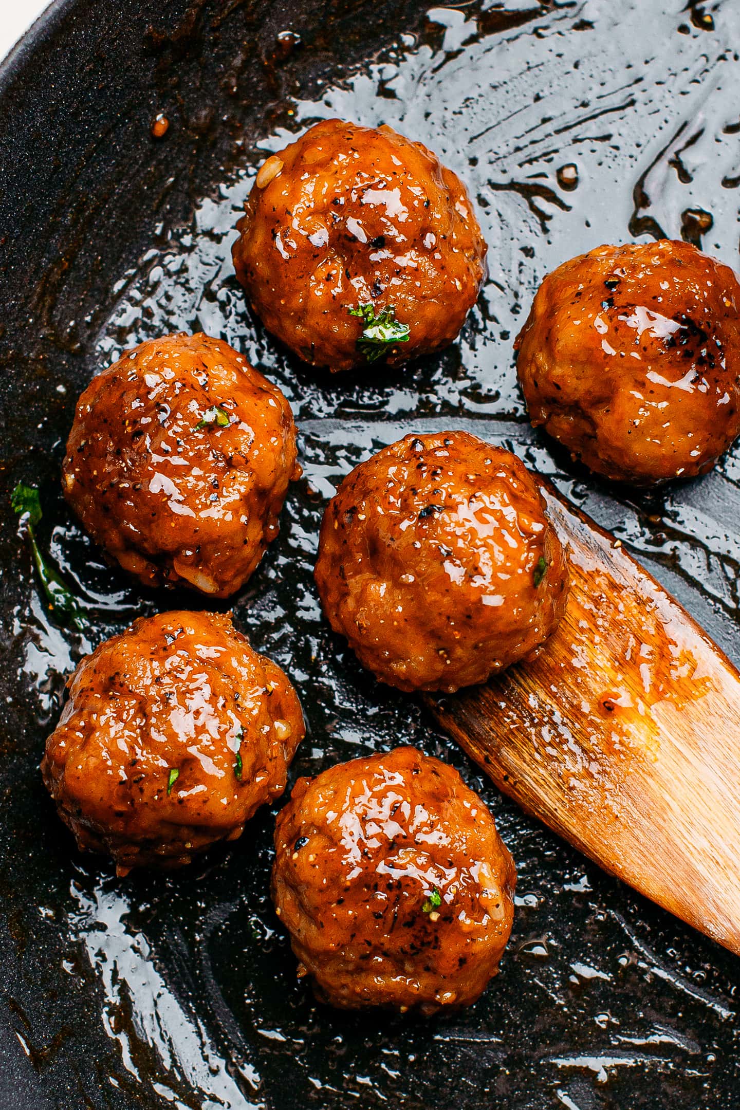 Vegan meatballs cooked in soy sauce.