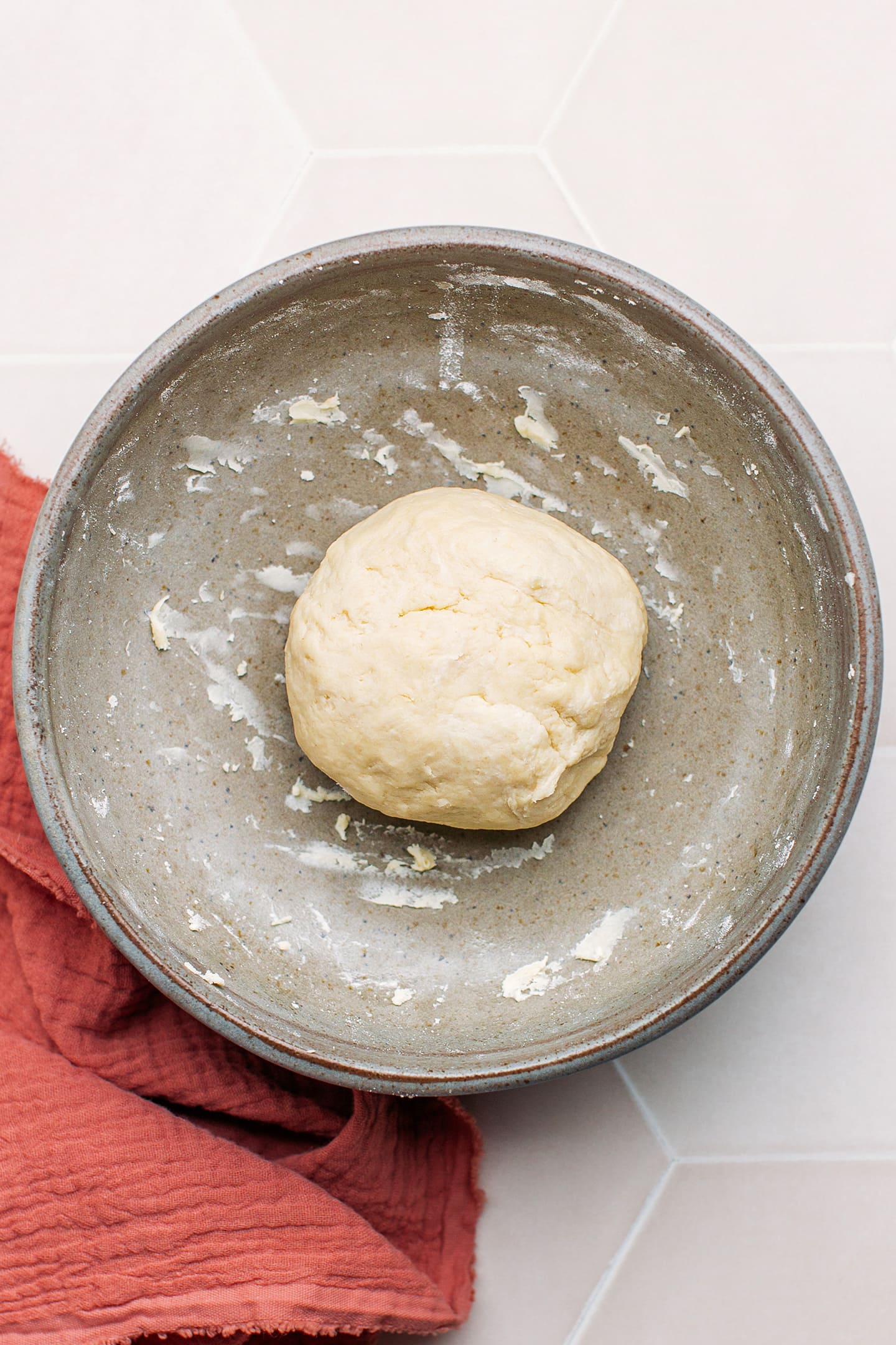 Ball of dough in a bowl.