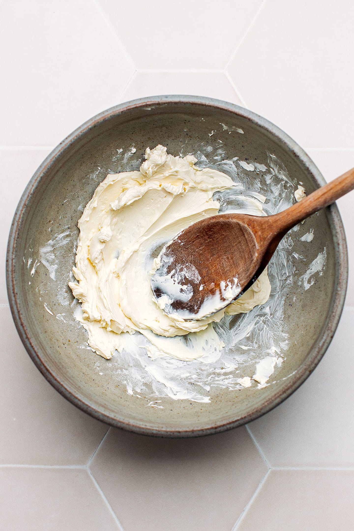 Creamed butter in a mixing bowl.