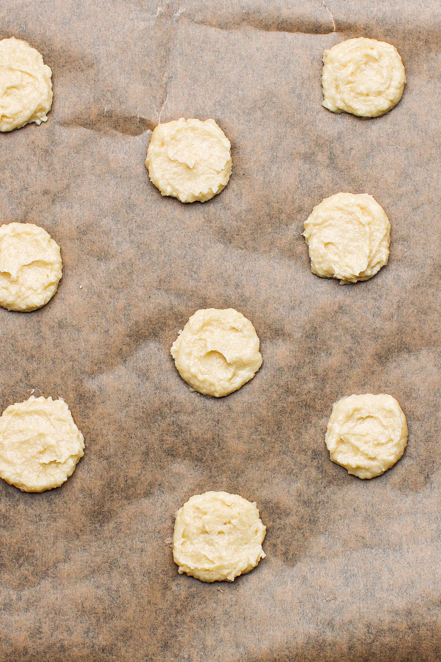 Dollops of dough on a baking sheet.