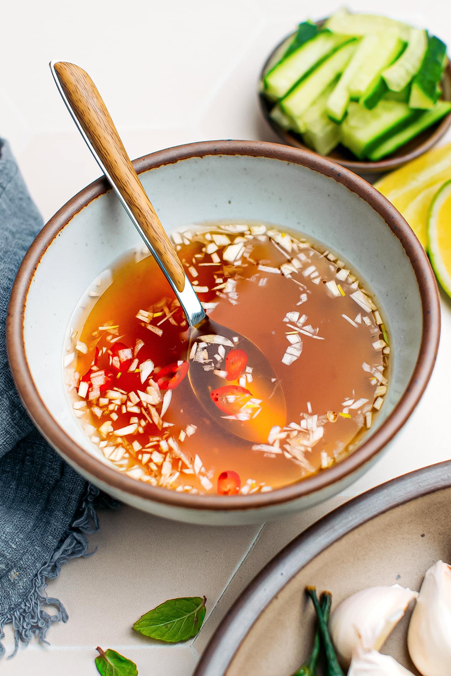 Nuoc cham with garlic and chili in a small bowl.