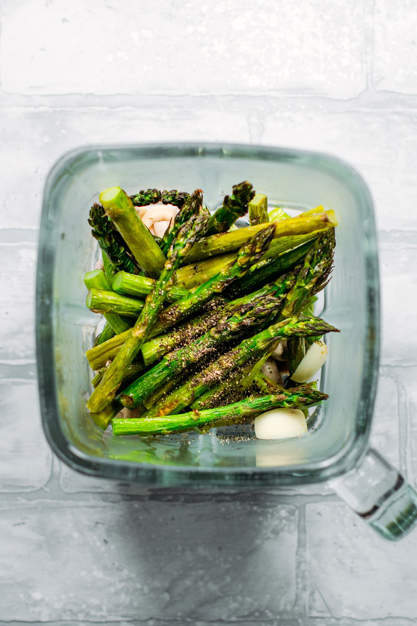 Roasted asparagus in a blender.