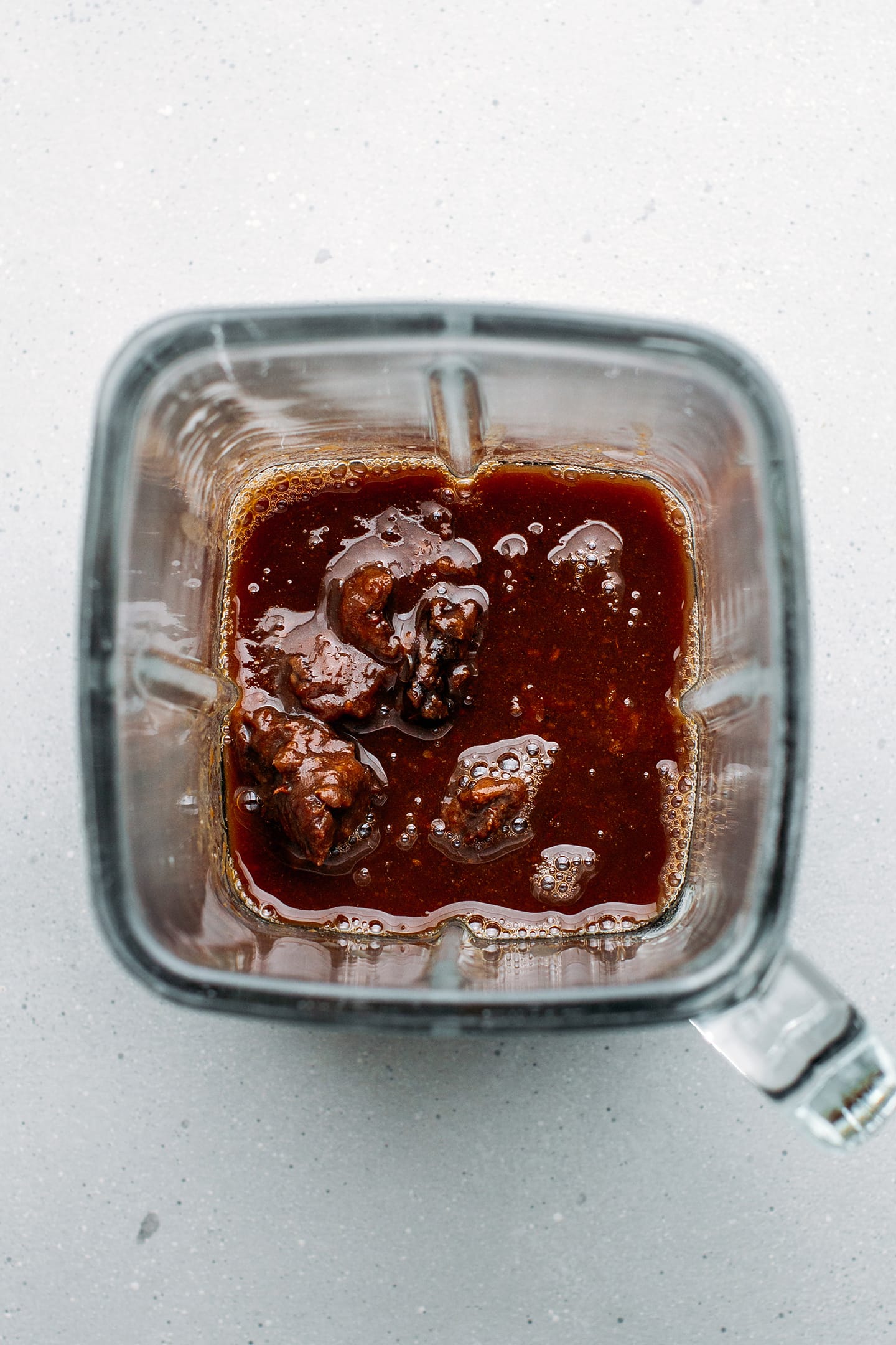 Tamarind pulp and water in a blender.