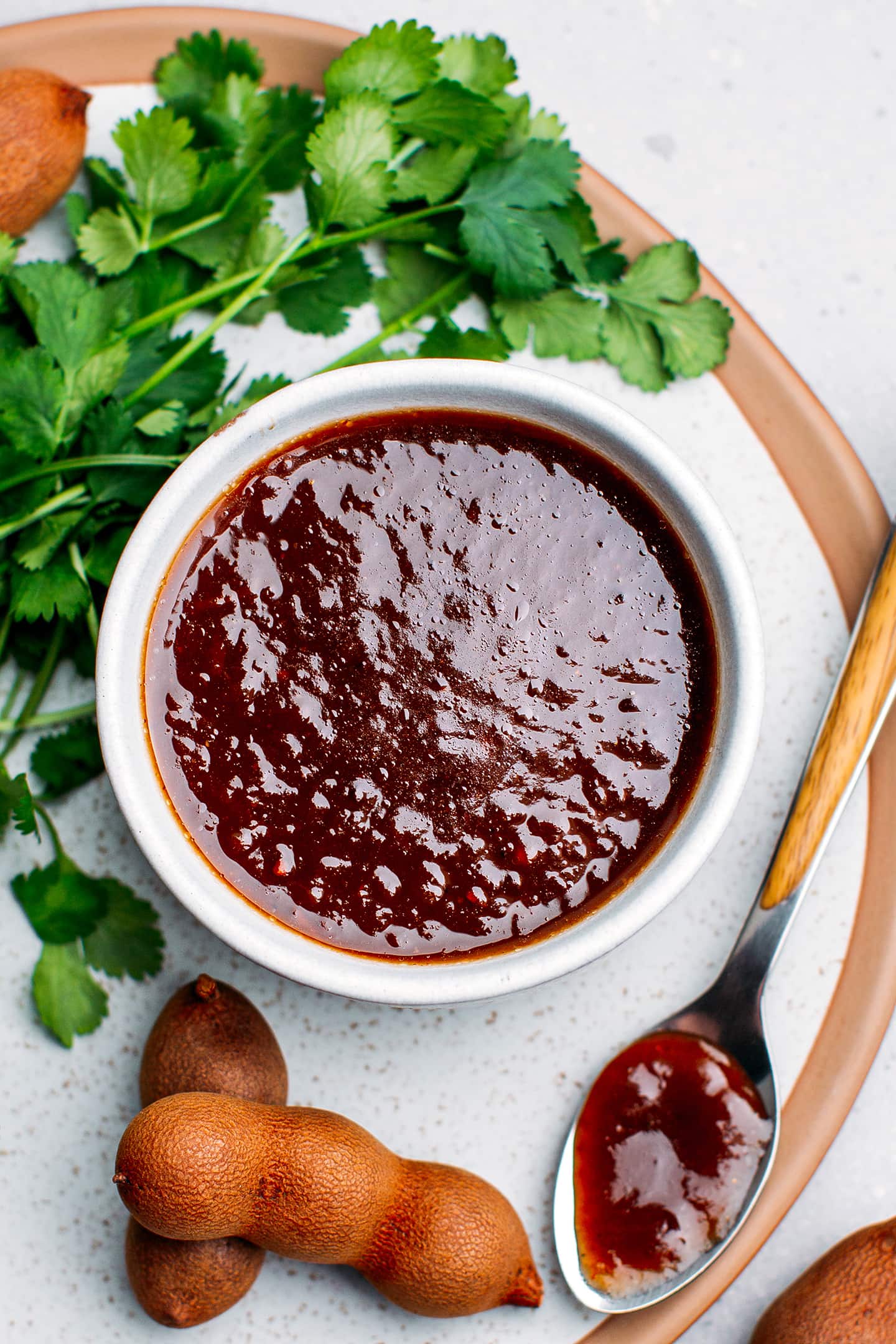 Top view of a bowl containing tamarind sauce.