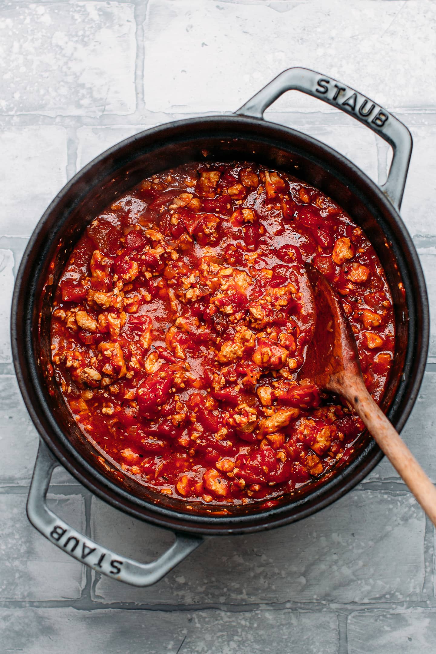 Tomato and tofu in a pot.